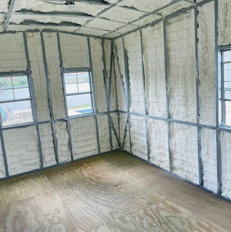 Closed-cell spray foam insulation applied to wall cavities in a residential project in Hanover Park